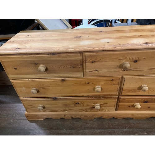 214 - Solid pine 7 drawer chest.
67