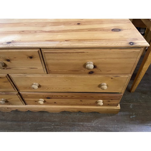 214 - Solid pine 7 drawer chest.
67