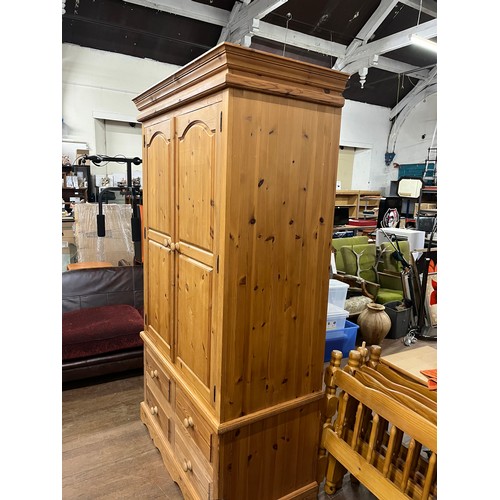 213 - Solid pine 2 door 4 drawer wardrobe (comes in 3 parts)
84