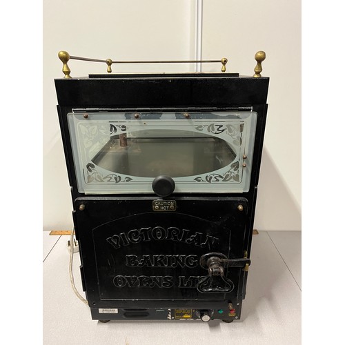 73 - Victorian baking ovens Ltd potato oven with heated ceramic tile top.  working. Stores 60 potatoes 
7... 