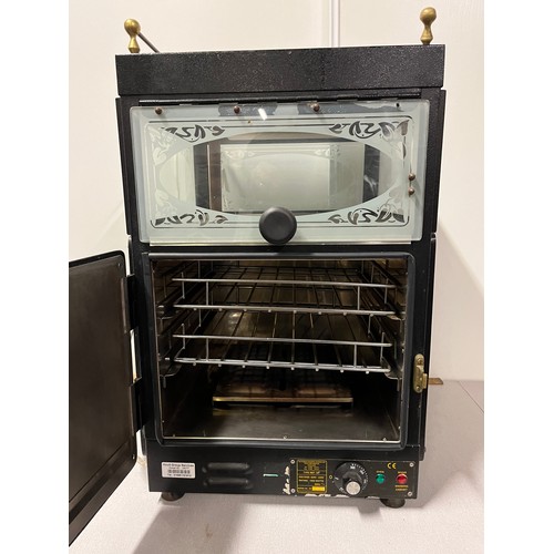 73 - Victorian baking ovens Ltd potato oven with heated ceramic tile top.  working. Stores 60 potatoes 
7... 