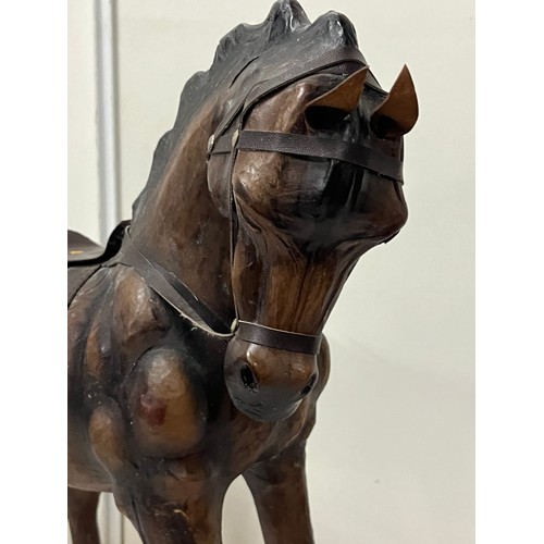 59 - Large vintage leather horse.
17.5