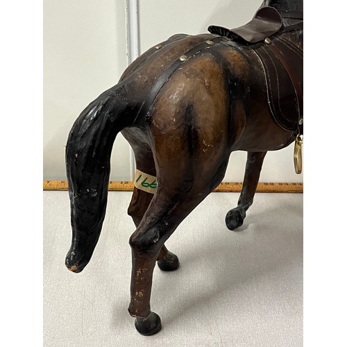 59 - Large vintage leather horse.
17.5