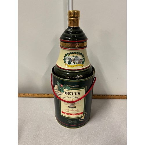 74 - Bells Scotch whisky Christmas 1990 decanter & tin full & sealed.