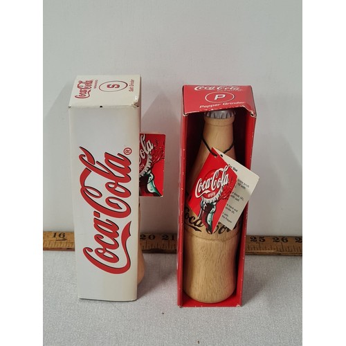 268 - Coca Cola branded wooden salt and pepper grinders.