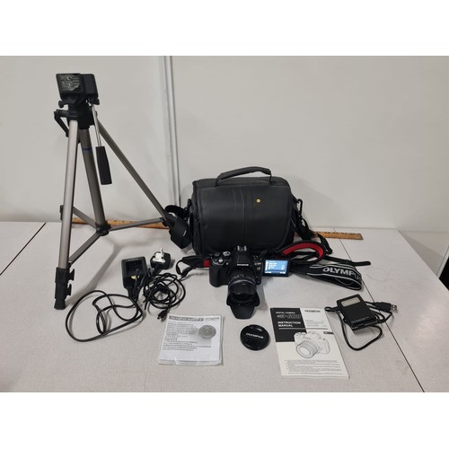 112 - Digital Olympus e-600 camera with lens, tripod, Sandstrom bag & instructions etc.