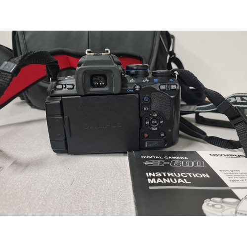 112 - Digital Olympus e-600 camera with lens, tripod, Sandstrom bag & instructions etc.