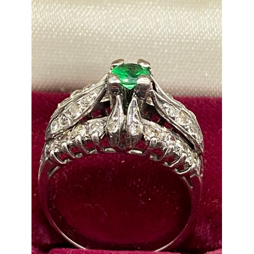 33 - 18ct white gold diamond cluster ring with synthetic emerald. Total 36 diamonds 0.60 carats.