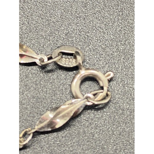44 - Prasiolite quartz and white topaz sterling silver heart shaped pendant along with silver bracelet.