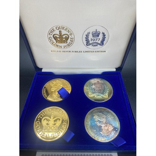 69 - Tower Mint Queen Elizabeth II 22ct gold plated golden jubilee and Sterling silver plated 1977 coin s... 