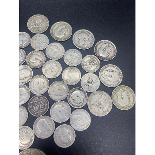 56 - Collection of silver coins to include Victoria and George V Six pence's and shillings.