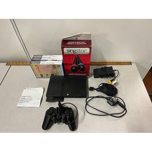 126 - PlayStation 2 along with singstar, games & controller.