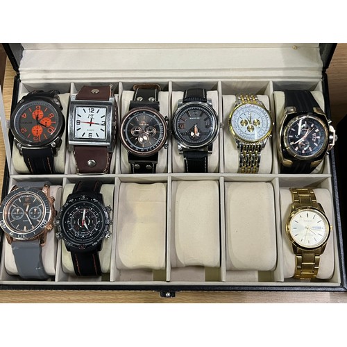 166 - 9 modern watches along with 2 watch display boxes
(batteries needed)