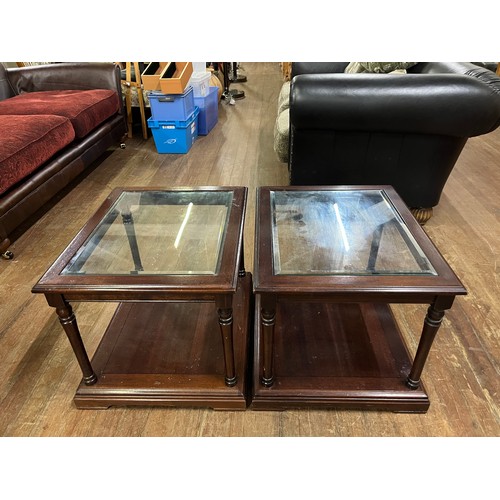 342 - 2 Glass topped side tables.