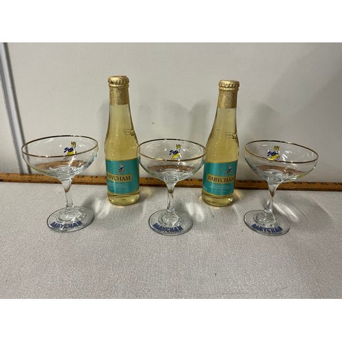 141 - 3 Vintage Babycham glasses along with 2 bottles of Babycham.