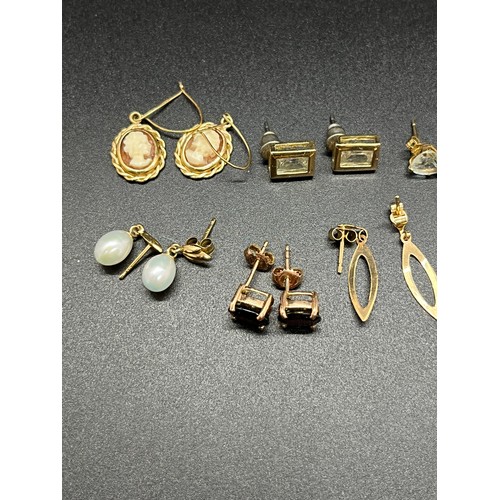 175D - 9 pairs of 9ct gold earrings. 10.6g