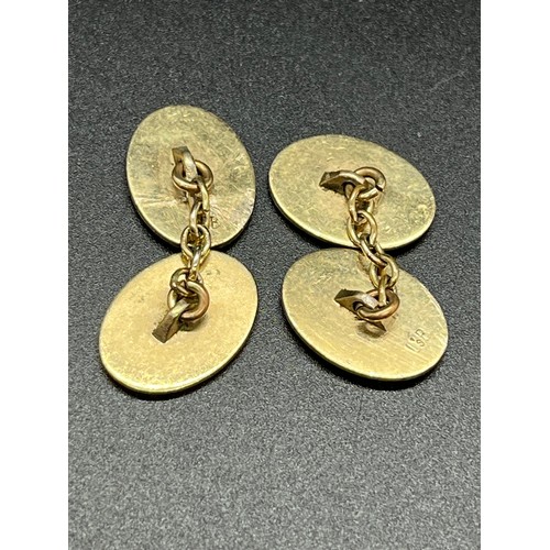 250B - Pair of 14ct gold and enamel cuff links. 11.4g