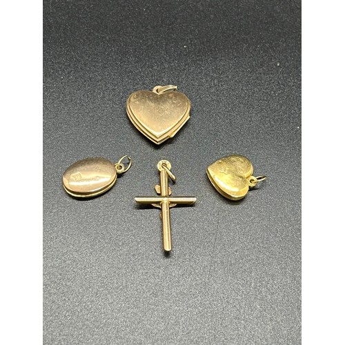 250D - 3 9ct gold lockets and crucifix. 4.5g