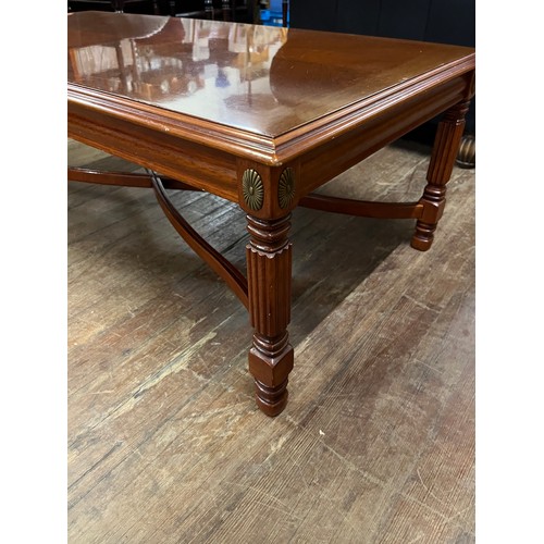 322 - Coffee table with brass detailing.