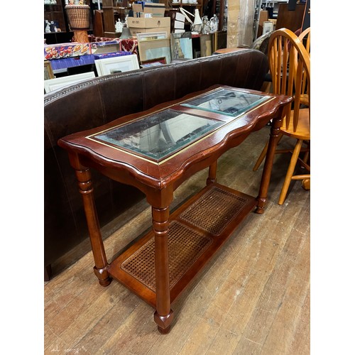 323 - Glass top console table. 38 x 26 inches