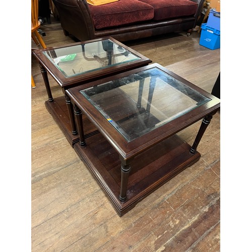 342 - 2 Glass topped side tables.