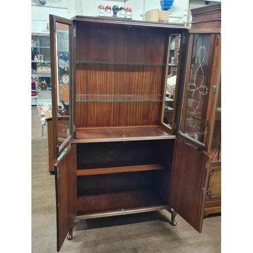 321 - Vintage glass display cabinet with key.
65