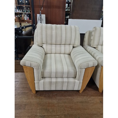 214 - 3 Piece Ercol suite & footstool in blonde.