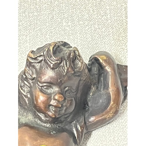 61 - Pair of bronze/brass cherub wall sculptures.
6