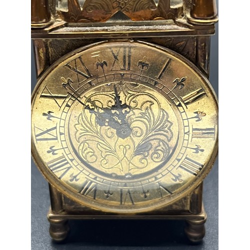 118 - Vintage Miniature brass lantern clock with mechanical swiss movement, working.
4