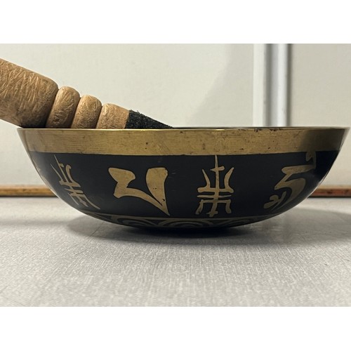 71 - Tibetan singing bowl along with heavy bronze & stone filled Buddha on plinth.
Buddha 13