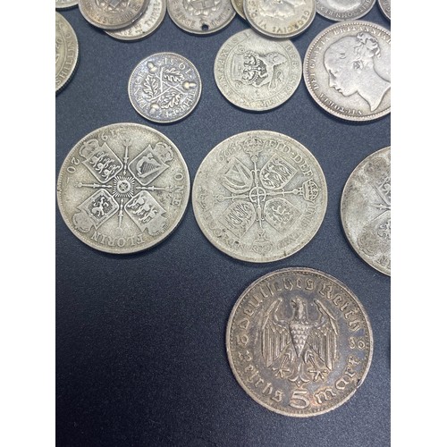 72 - Large collection of silver coins to include 1936 Germany Reichsmark church mark, 1920's florins, Shi... 