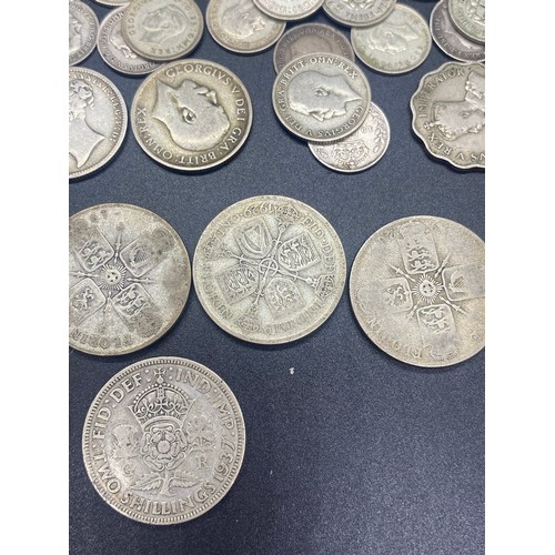 72 - Large collection of silver coins to include 1936 Germany Reichsmark church mark, 1920's florins, Shi... 