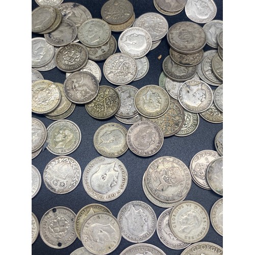 72 - Large collection of silver coins to include 1936 Germany Reichsmark church mark, 1920's florins, Shi... 