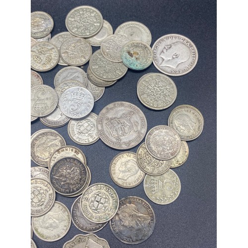 72 - Large collection of silver coins to include 1936 Germany Reichsmark church mark, 1920's florins, Shi... 