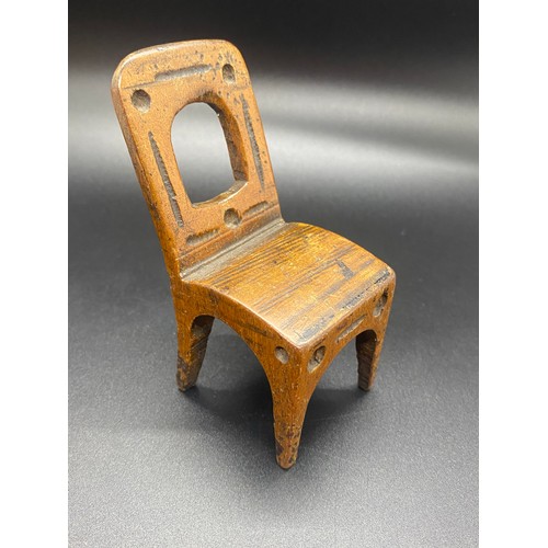 179 - Vintage arts and crafts oak chair along with tin plate post office bank.