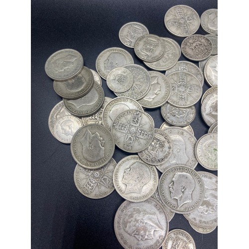 39 - Large collection of silver coins to include shillings, half crowns and Florins etc. 495g