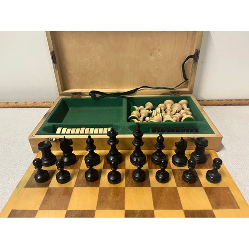 126 - Vintage wooden chess & draughts set in fitted wooden case.
Tallest piece 3