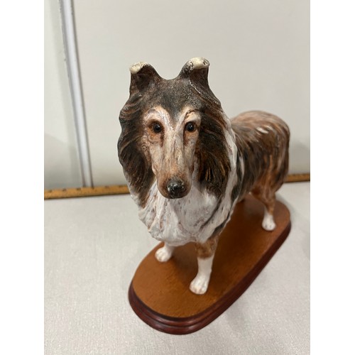 139 - Pair of Vintage large ceramic collies on wooden base both stamped by the artists.
13