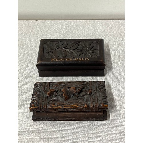 33 - 2 black forest carved stamp holders.