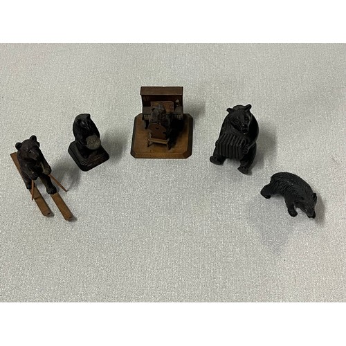 93 - Selection of Black forest carved bears to include piano player, accordion player & skier etc.
Talles... 