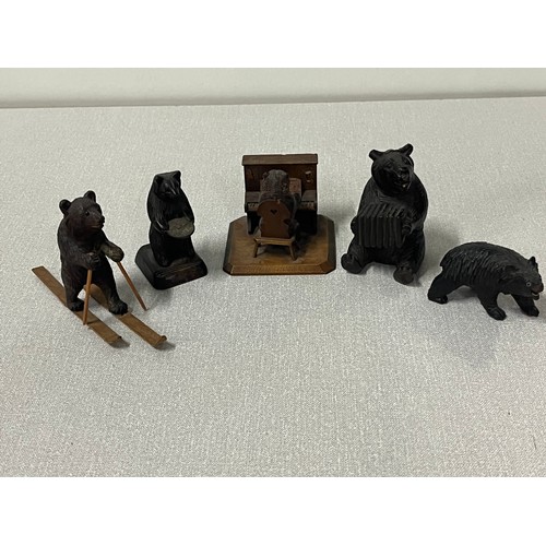 93 - Selection of Black forest carved bears to include piano player, accordion player & skier etc.
Talles... 