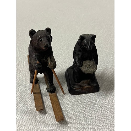 93 - Selection of Black forest carved bears to include piano player, accordion player & skier etc.
Talles... 