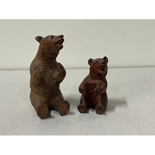 95 - 2 Antique hand carved Black Forest laughing bears.
Tallest 5.5