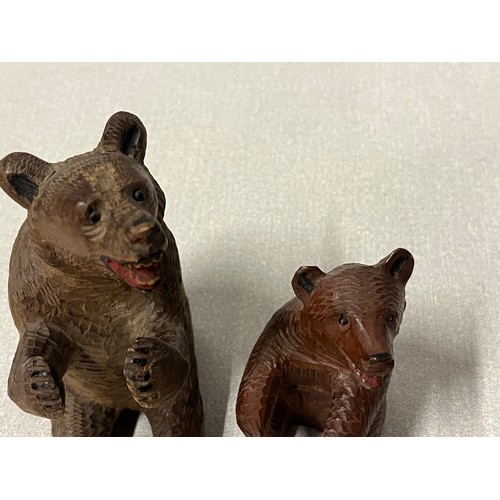 95 - 2 Antique hand carved Black Forest laughing bears.
Tallest 5.5