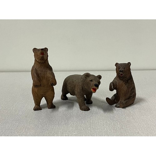 146 - 3 Antique and carved black forest bears.
tallest 5