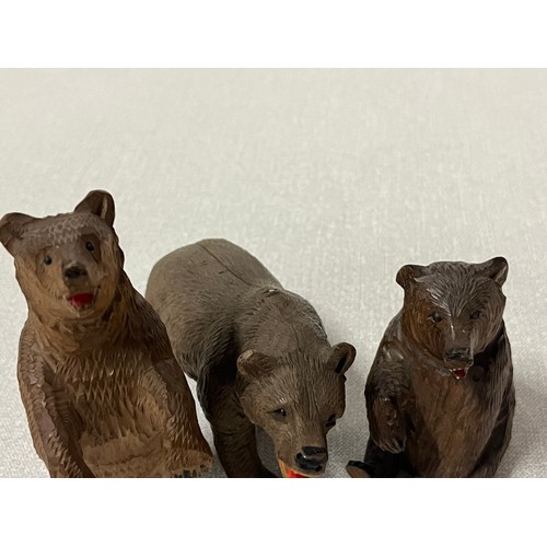 146 - 3 Antique and carved black forest bears.
tallest 5