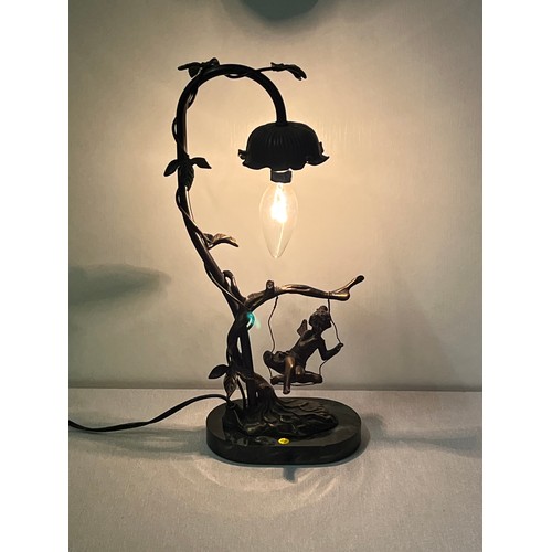 79 - Bronze cherub on swing, lamp with marble base.
15”