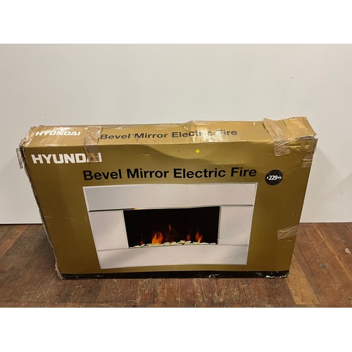 515 - New & boxed Hyundai bevel mirror electric fire. 
R.R.P £229.99