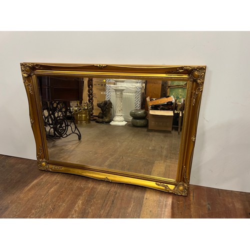 530 - Large gilt framed bevel edged mirror.
41