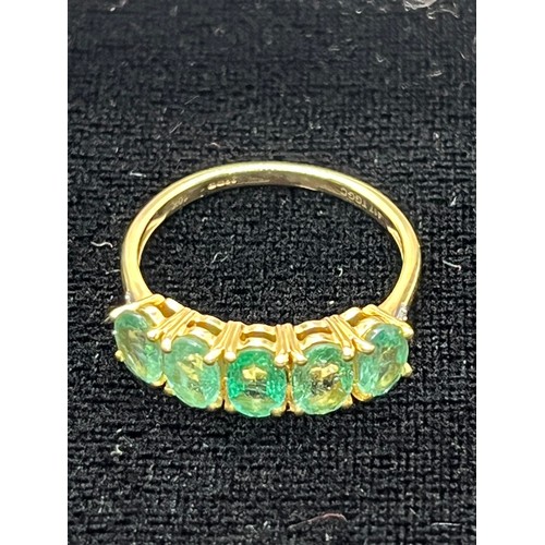 28 - 10 carat gold & emerald ladies ring